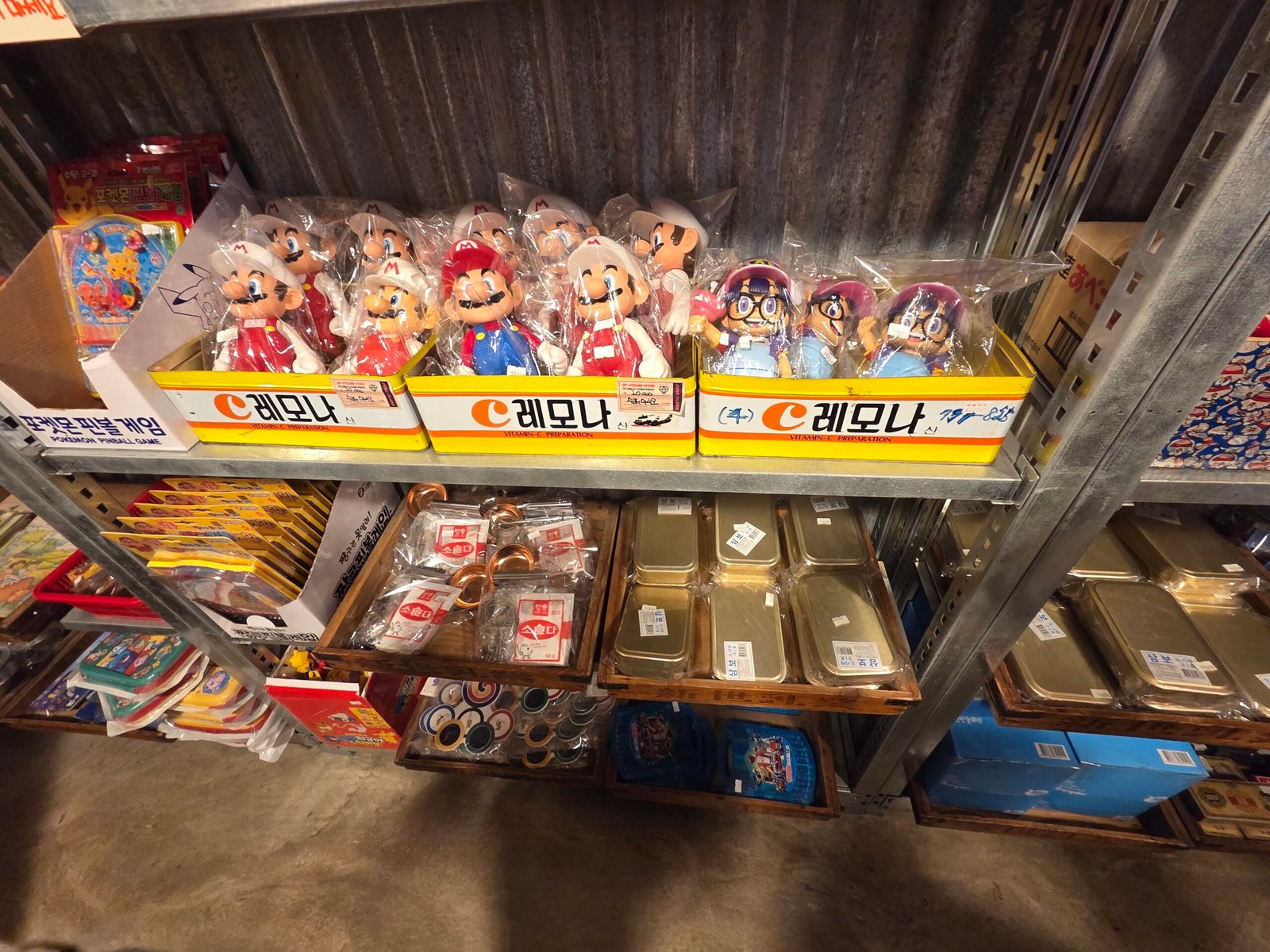 Retro Korean character toys and metal boxes at Dongshim Shopping Center